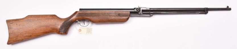 A .22” Relum Tornado underlever air rifle, number 17401, with varnished beech stock having grooved