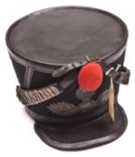A Russian grenadiers shako in the style of the Napoleonic 1st Empire, of blue cloth with leather