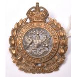 An OR’s bimetal cap badge of the City of London Imperial Yeomanry, GC (centre backing plate missing)