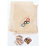 A German small gilt and white enamel pin back badge for the 1936 Berlin Olympics, the back marked “