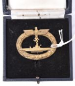 A Third Reich U boat badge, by Frank & Reif, in its box with gilt impressed lid. GC