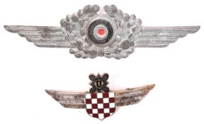 A silver plated and enamel breast badge of the Croatian Air Force Legion, with pin back; and a Third