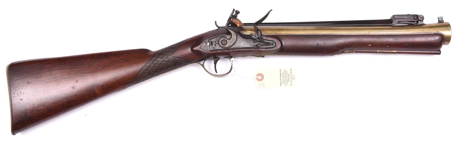 A brass barrelled flintlock blunderbuss with spring bayonet, c 1800, 29½” overall, swamped barrel