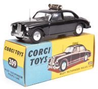 Corgi Toys Riley Pathfinder Police Car (209). In gloss black with sign to roof and aerial to drivers