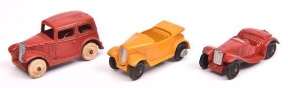 3 Dinky 35 Series Cars. Saloon Car (35a) in red with white rubber wheels. A MG Sports Car (35c) in