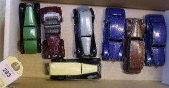 7x Dinky Toys cars. An early post-war Bentley (36b) in light green with black chassis and non-ridged