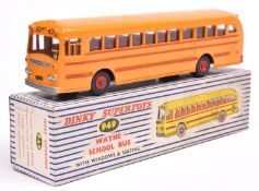 A Dinky Supertoys Wayne School Bus (949). In orange with red plastic wheels and red lines. Boxed,