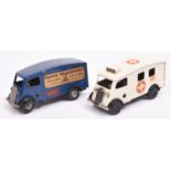 2x Tri-ang Minic post-war clockwork vehicles. A Shutter Van (103M) in dark blue with 'Minic