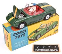 Corgi Toys Lotus Elan (318). An unusual example, (as sold). In dark green with yellow racing stripe,