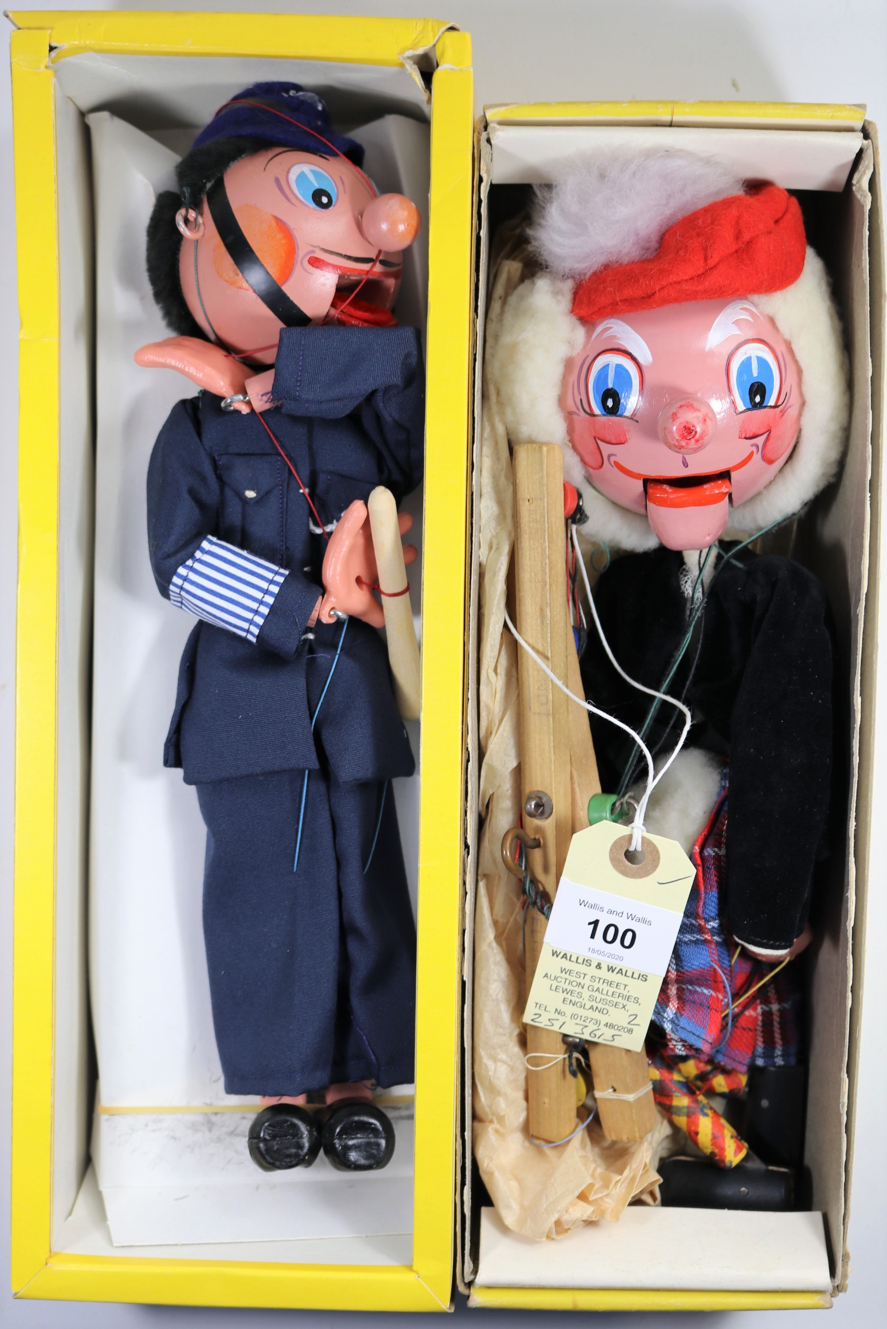 2 Pelham Puppets. Policeman (SM6). In dark blue uniform with helmet holding his truncheon. In a late