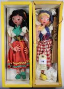 2 Pelham Puppets. Mitzi SS8 with red skirt with yellow and green wavy lower decoration, white blouse