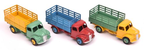 3 Dinky Toys Dodge Farm Produce Wagons (343). All different examples- Cab and chassis in yellow with