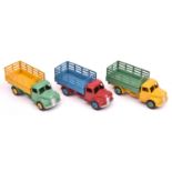 3 Dinky Toys Dodge Farm Produce Wagons (343). All different examples- Cab and chassis in yellow with