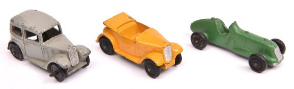 3 Dinky 35 Series Cars. Saloon Car (35a) light grey with black rubber wheels. A Midget Racer (35b)