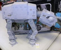 A Palitoy Star Wars Return of the Jedi AT-AT. A French release 'Le Retour du Jedi' Falcon,