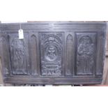 An 18thC oak panel, possibly the front of a coffer. With gothic lancets and 3 panels with carved