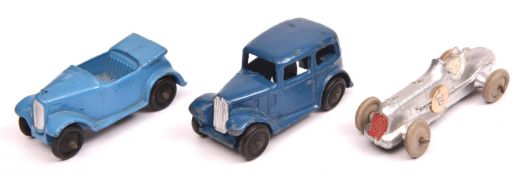 3 Dinky 35 Series Cars. Saloon Car (35a) dark blue with black rubber wheels. A Midget Racer (35b) in