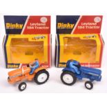 2x Dinky Toys Leyland 384 Tractor (308). One example in dark blue, the other in orange. Both with