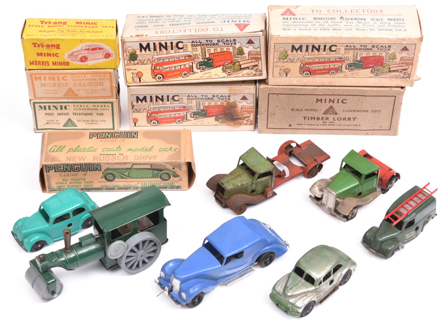 5x Tri-ang Minic and Penguin plastic vehicles. A Morris Saloon (94M) in green. Morris Minor (97M) in