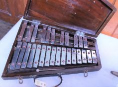 A glockenspiel in a substantial wooden case. Made by Mayers & Sons, Manchester with thick chrome