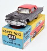 Corgi Toys Ford Thunderbird (214S). Example in dark metallic grey with red roof and yellow interior,