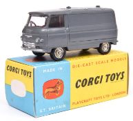 A Rare Corgi Toys Promotional Model. One of a short run Commer Vans finished in dark grey with