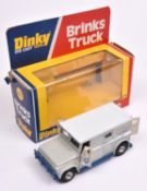 A Dinky Toys US issue Brinks Truck (275). Example with grey body, light grey roof and blue