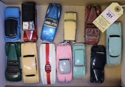 12 Dinky Toys most for restoration. Including 9 over painted examples, Mini Clubman, Ford Anglia,