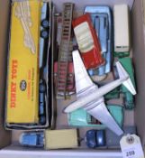12 Dinky Toys. Pullmore Car Transporter and loading ramp, both in well worn/damaged boxes. Plus a