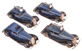 4x Tri-ang Minic clockwork Vauxhall Traffic Control Cars (29M). A pre-war example with single loud-