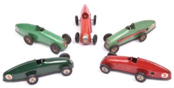 5x Tri-ang Minic clockwork Racing Cars (13M). All pre-war examples; 2x red - RN5, 2x light green -