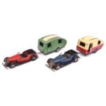 4x Tri-ang Minic post-war clockwork vehicles. 2x Vauxhall Cabriolet (19M), one in dark blue, the