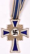 A Third Reich Mother's Cross, appears to have originally been gold, the back retaining gold