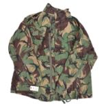 A Denison type camouflage smock, 4 pockets, zip up and 4 button front, with shoulder straps. GC (