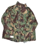 A Denison type camouflage smock, 4 pockets, zip up and 4 button front, with shoulder straps. GC (