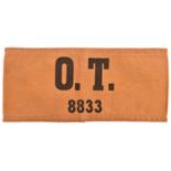 A Third Reich armband, black “O T 8833” on khaki (Organisation Todt), GC