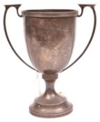 A two handled silver prize cup, engraved “Lewes Miniature Rifle Club, The Edward A. Glover Cup,