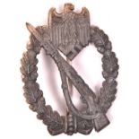 A Third Reich Infantry Assault badge, of grey metal with feint traces of silver finish, round wire