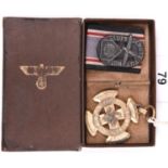 A Third Reich 1st class Luftschutz Decoration, with ribbon, in its box. GC (gilt finish worn);