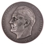 A Third Reich grey metal medallion “For outstanding achievements in the technical branch of the