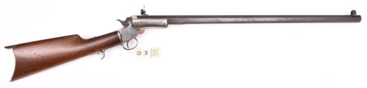 A .32” rimfire Stevens centre hammer tip down rifle, number 10431, 40½” overall, heavy octagonal