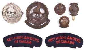 A bronzed WWI glengarry badge of the 15th CEF (48th Highlanders) and one matching collar; a