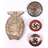 A Third Reich 1931 SA Brunswick Rally pressed tin pin “ back badge; an NSKK Kriegskraftfahrerin