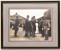 An early 20th century signed photograph of F. Marshal Lord Kitchener, wearing peaked cap and frock