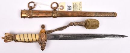 A Third Reich Naval officer's dagger, by WKC, in its' sheath with portepee. Basically GC (blade