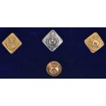 2 Scottish officers gilt diamond shaped doublet buttons, 1855-6: 71st and 74th; similar Vic