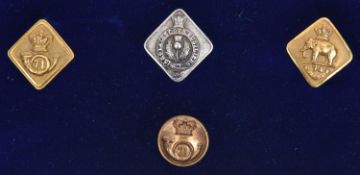 2 Scottish officers gilt diamond shaped doublet buttons, 1855-6: 71st and 74th; similar Vic