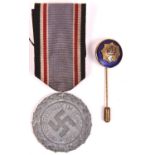 Third Reich grey metal Luftschutz Service medal, with ribbon; and RLB enamelled stick pin. GC