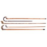 4 walking sticks: short plain dark wood with painted, carved duck's head finial; plain wood with