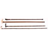 3 walking sticks slender bamboo, the polished dark green stone handle having a gold “ coloured band;